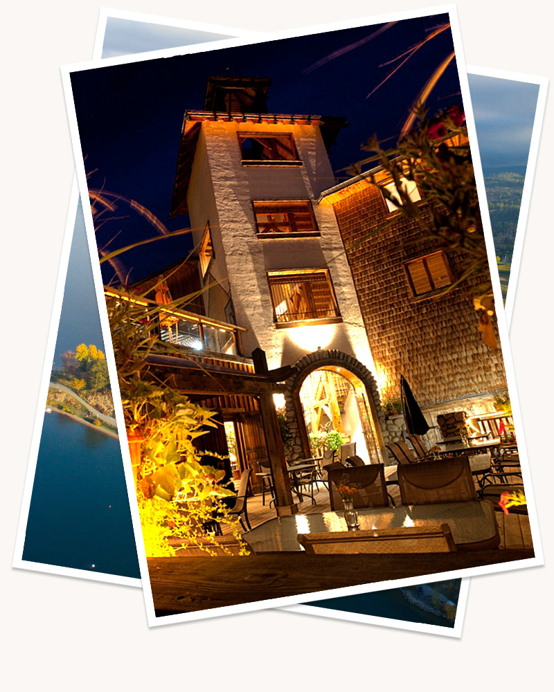 Two digitally stacked images, the top, visible image showing the Hillside Winery and Bistro at night, with warm lighting shining out around the tall brick building, and outdoor seating. 